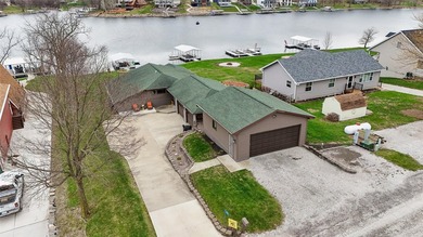 Wake up to stunning south-facing lake views from this - photo 3