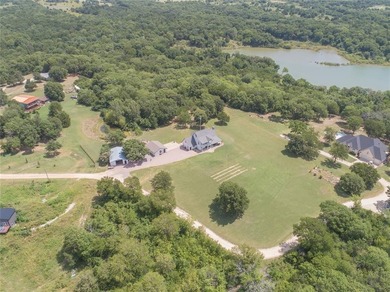 Perfectly positioned on 3.59 acres of secluded lakeside privacy - photo 5