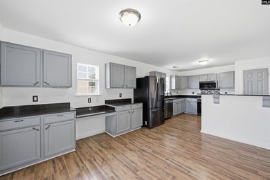Welcome home to 492 Denman Loop in the highly sought-after Lake - photo 10