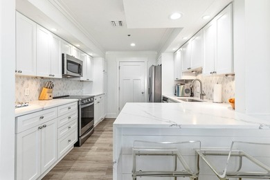 Discover this stunning beachfront condo at Beach Manor, located - photo 16