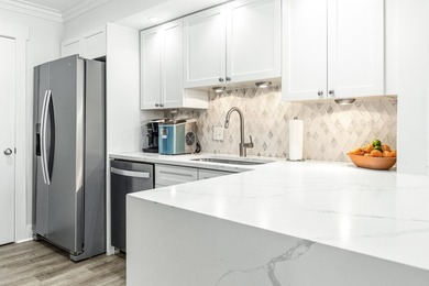 Discover this stunning beachfront condo at Beach Manor, located - photo 17