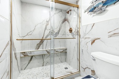 Discover this stunning beachfront condo at Beach Manor, located - photo 27