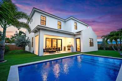 Located in Palm Beach Shores, this never-lived-in new - photo 1