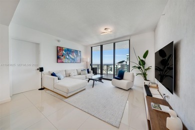 Enjoy expansive open bay views from the 48th floor at Aria on