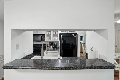 Experience island living at its finest in this beautifully