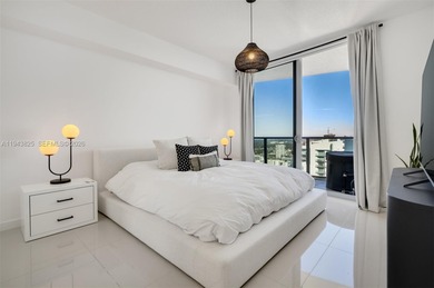 Enjoy expansive open bay views from the 48th floor at Aria on