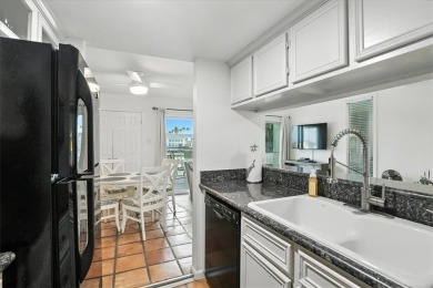 Experience island living at its finest in this beautifully