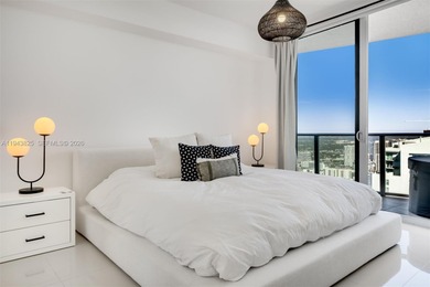 Enjoy expansive open bay views from the 48th floor at Aria on