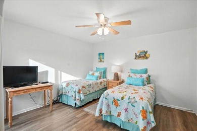 Experience island living at its finest in this beautifully