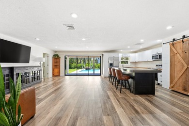 Welcome to this beautiful 4 bedroom 2 bathroom pool home in - photo 5