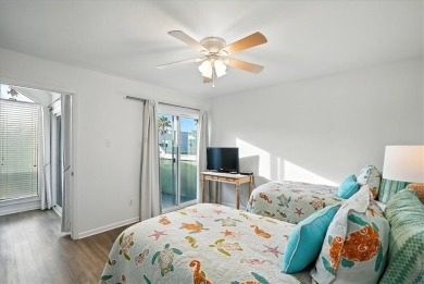 Experience island living at its finest in this beautifully