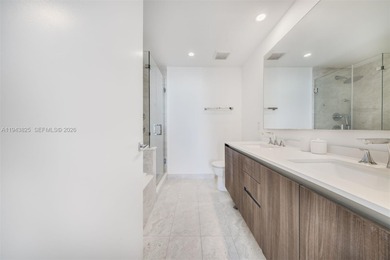 Enjoy expansive open bay views from the 48th floor at Aria on