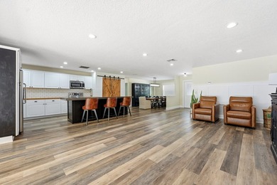 Welcome to this beautiful 4 bedroom 2 bathroom pool home in - photo 9