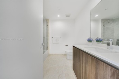 Enjoy expansive open bay views from the 48th floor at Aria on