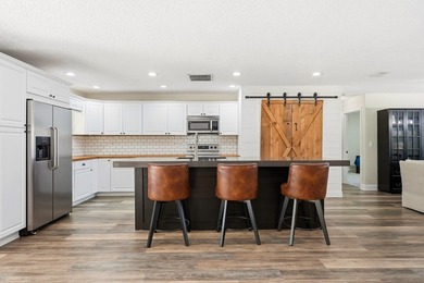 Welcome to this beautiful 4 bedroom 2 bathroom pool home in - photo 10
