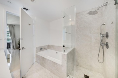 Enjoy expansive open bay views from the 48th floor at Aria on