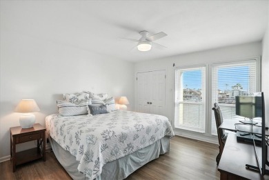 Experience island living at its finest in this beautifully