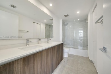 Enjoy expansive open bay views from the 48th floor at Aria on