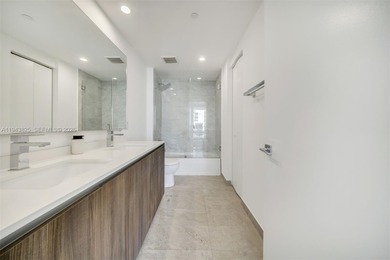 Enjoy expansive open bay views from the 48th floor at Aria on