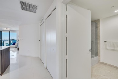 Enjoy expansive open bay views from the 48th floor at Aria on