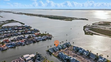 Experience island living at its finest in this beautifully