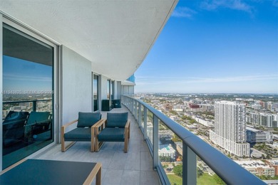 Enjoy expansive open bay views from the 48th floor at Aria on