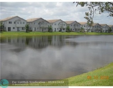 Lake Townhome/Townhouse For Sale in Riviera Beach, Florida