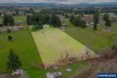 Mostly flat 2.7-acre property in desirable Shaw area within