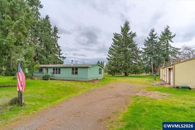 Mostly flat 2.7-acre property in desirable Shaw area within