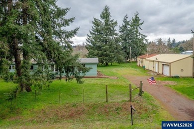 Mostly flat 2.7-acre property in desirable Shaw area within