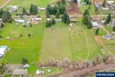 Mostly flat 2.7-acre property in desirable Shaw area within