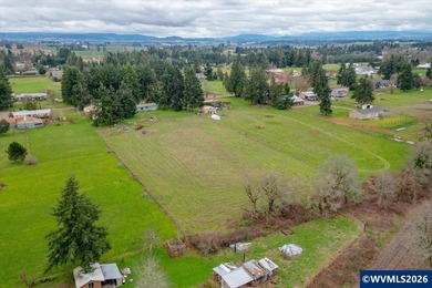 Mostly flat 2.7-acre property in desirable Shaw area within