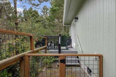 Tucked away & private on a wooded knoll in Heceta South, this - photo 37