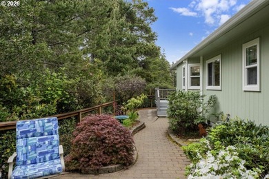 Tucked away & private on a wooded knoll in Heceta South, this - photo 40
