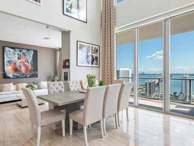 Penthouse 207 is a two-story residence offering expansive