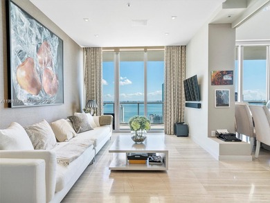 Penthouse 207 is a two-story residence offering expansive