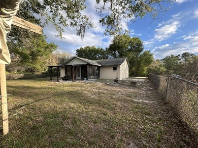 Short Sale. Tucked away in a peaceful rural setting, this - photo 3
