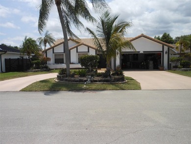 This spacious 3-bedroom, 2-bath home is nestled on a quiet - photo 1
