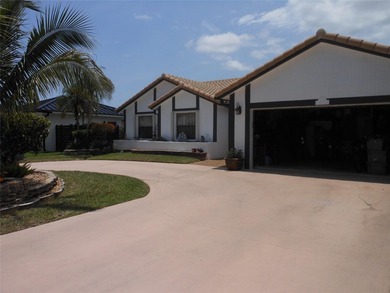 This spacious 3-bedroom, 2-bath home is nestled on a quiet - photo 2