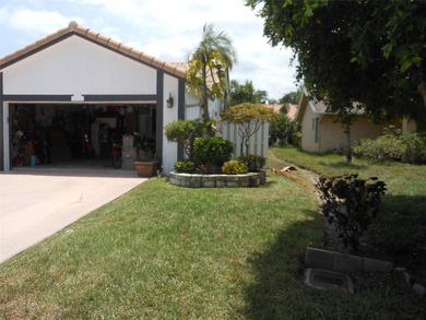 This spacious 3-bedroom, 2-bath home is nestled on a quiet - photo 3