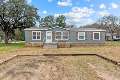 Welcome to this beautiful 2022 mobile home, offering peace of - photo 4