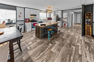 Welcome to this beautiful 2022 mobile home, offering peace of - photo 6