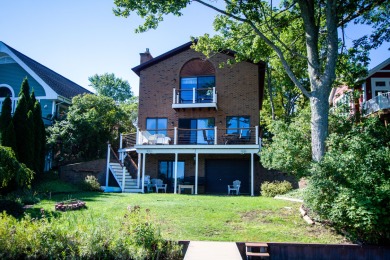 Bostwick Lake Home For Sale in Rockford Michigan
