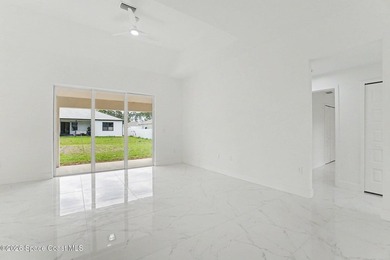 This beautifully designed 4 bed 2 bath concrete block home - photo 11