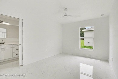 This beautifully designed 4 bed 2 bath concrete block home - photo 14
