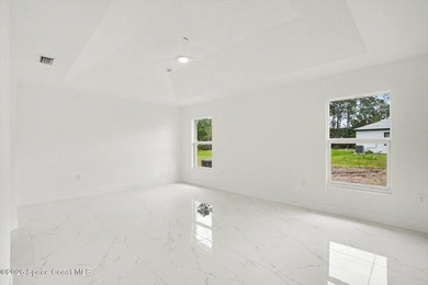 This beautifully designed 4 bed 2 bath concrete block home - photo 17