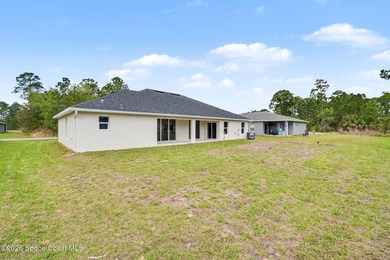 This beautifully designed 4 bed 2 bath concrete block home - photo 23