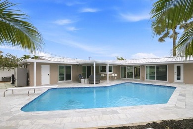 Experience year-round tropical oasis in this 1860-square-foot - photo 1