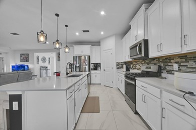 Welcome to this exceptional 4-bedroom, 3-bathroom single-family - photo 7