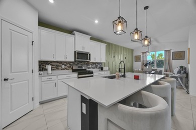 Welcome to this exceptional 4-bedroom, 3-bathroom single-family - photo 9